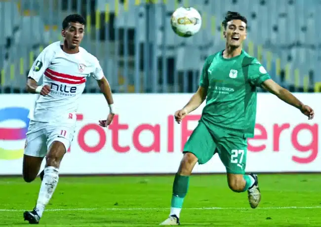 oussama zemraoui of al masry sc challenges ahmed abdelhamid of zamalek scaled e1770284488136 - OnzedAfrik